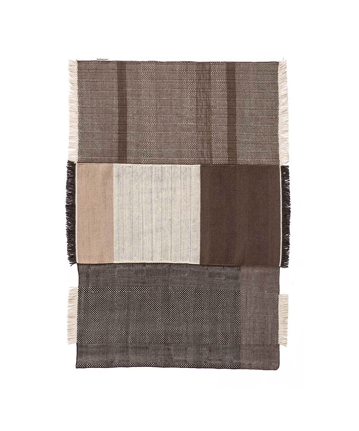 http://www.trnk-nyc.com/cdn/shop/products/nanimarquina-tres-rug-in-chocolate-product.jpg?v=1572005500